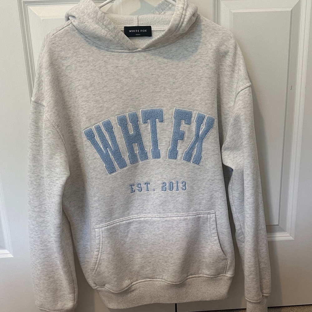 white fox woman’s hoodie